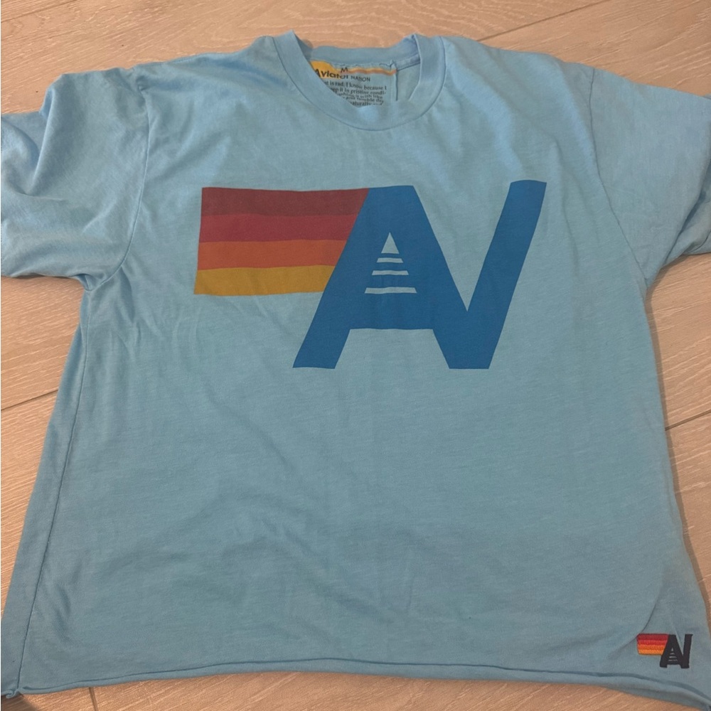 Aviator Nation Light Blue Tee with Rainbow Graphic